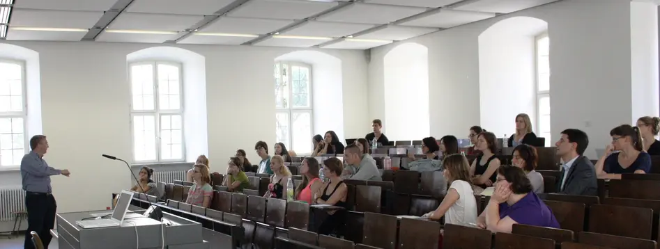 Photo of Barry Laga giving his talk and attendees listening to him.